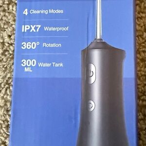 Operan Cordless Oral Irrigator (water flosser).